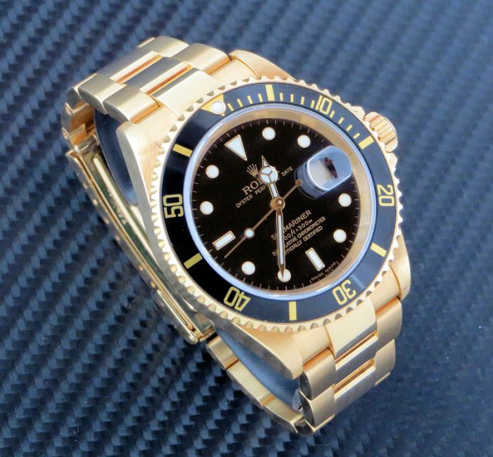 18ct gold Rolex Submariner with Rolex box and paper